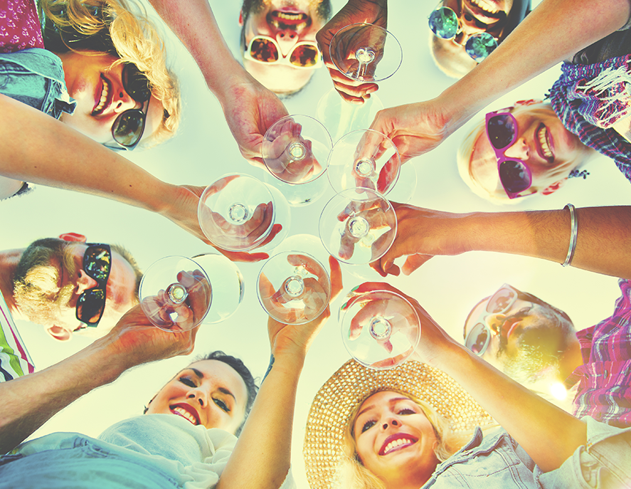 Group of people raising Toasting Glasses